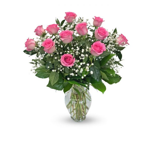 dozen pink roses in vase with baby's breath